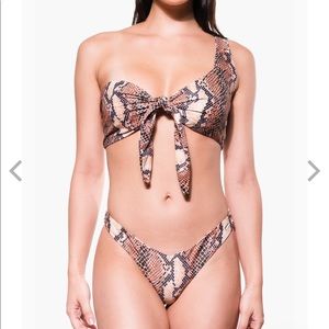 Selling both top and bottom. NEVER WORN!